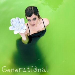 Image of Rya standing in a pool of green water, holding a white flower. The word Generational is written on the petals of the flower. 