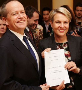 CANBERRA, AUSTRALIA - JUNE 01:  Leader of the Opposition Bill Shorten and Deputy Leader of the Opposition Tanya Plibersek pose with the same-sex marriage bill during a morning tea at Parliament House on June 1, 2015 in Canberra, Australia. The proposed changes to the Marriage Act will define marriage as  "the union of two people to the exclusion of all others, voluntarily entered into for life" reversing amendments by former Prime Minister John Howard in 2004 to define marriage as between a "man and a woman to the exclusion of all others".  (Photo by Stefan Postles/Getty Images)