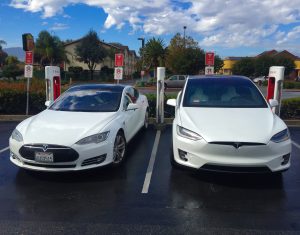Tesla_Model_S_&_X_side_by_side_at_the_Gilroy_Supercharger